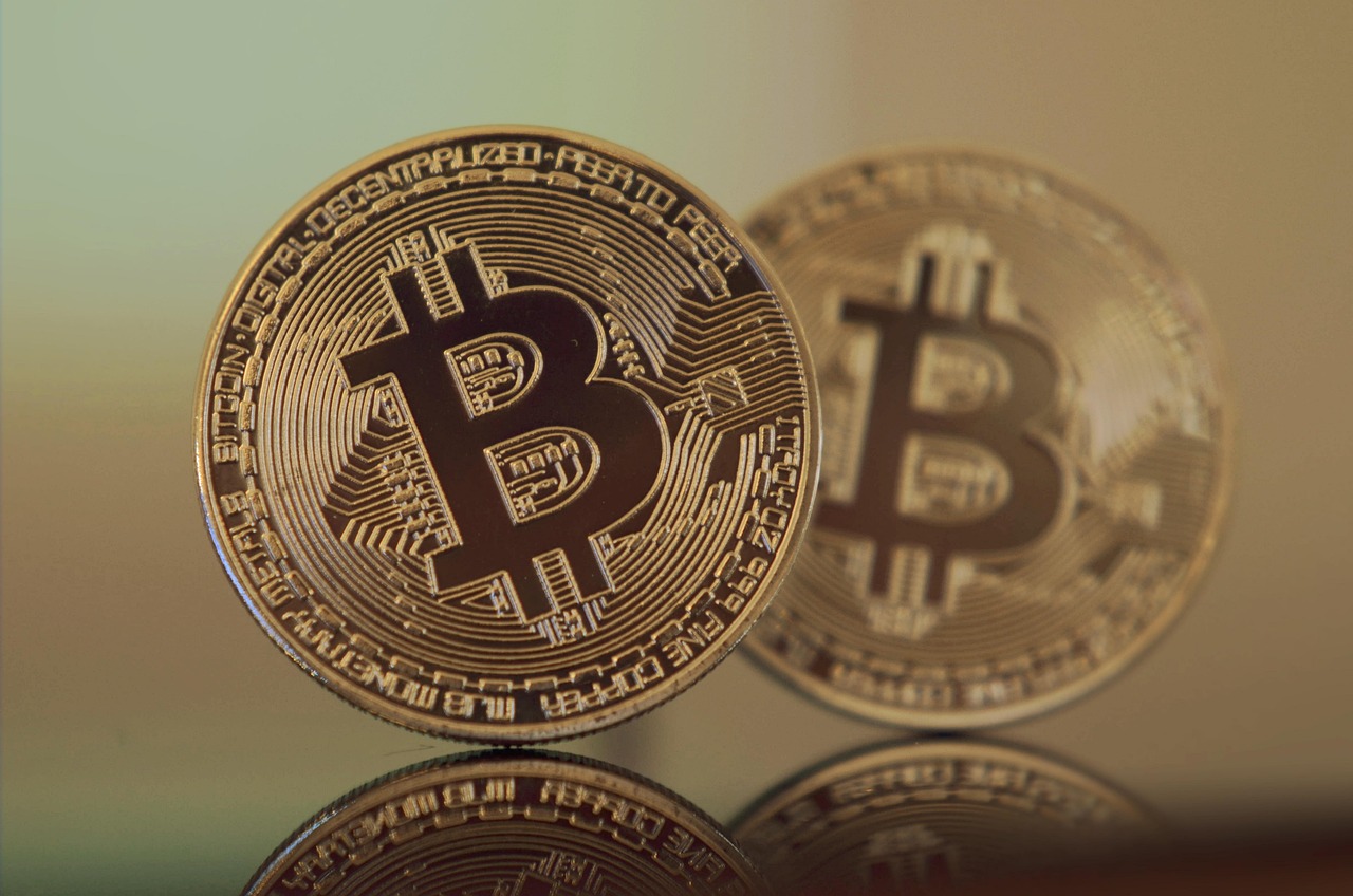 马斯克回归特斯拉、减少DOGE工作！TSLA与狗狗币双双暴涨